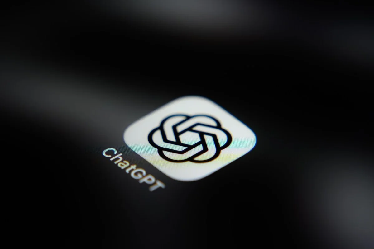 The ChatGPT application icon is displayed on a smartphone screen.