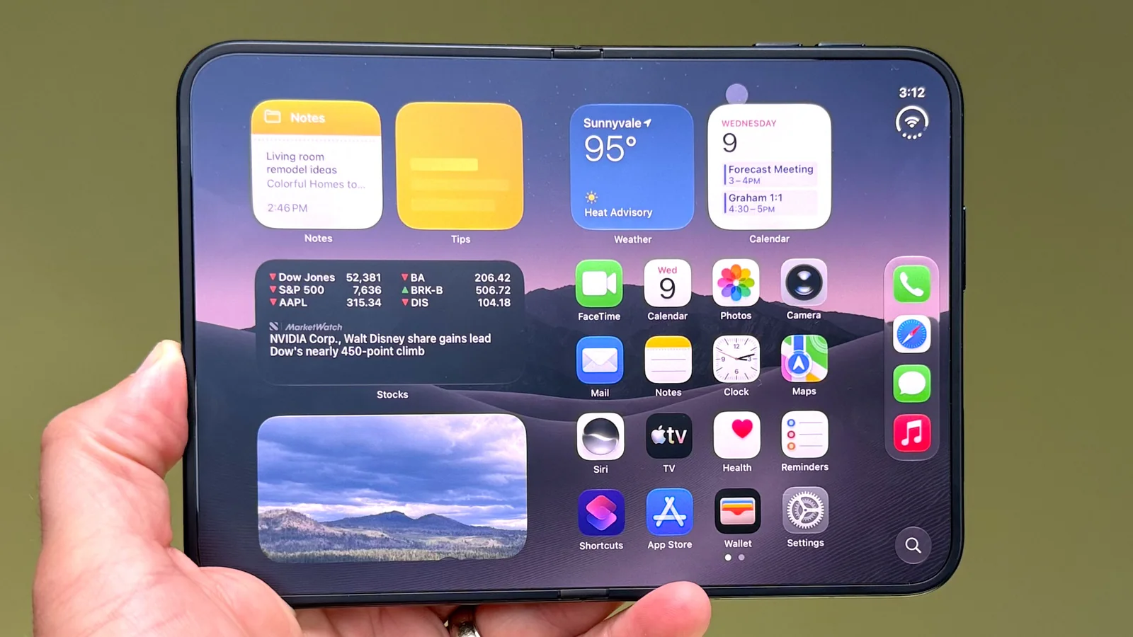 Apple iPhone Duo shown in hand