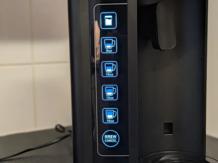 buttons on machine to choose concentrate level and sizes.