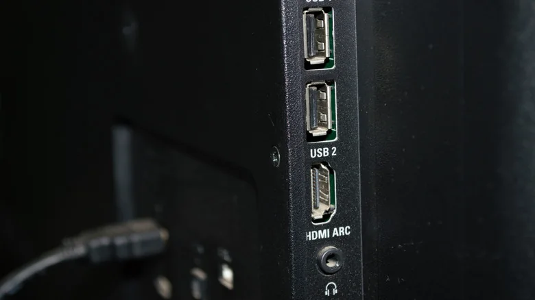TV side details, with two USB inputs, one HDMI ARC and headphone jack.