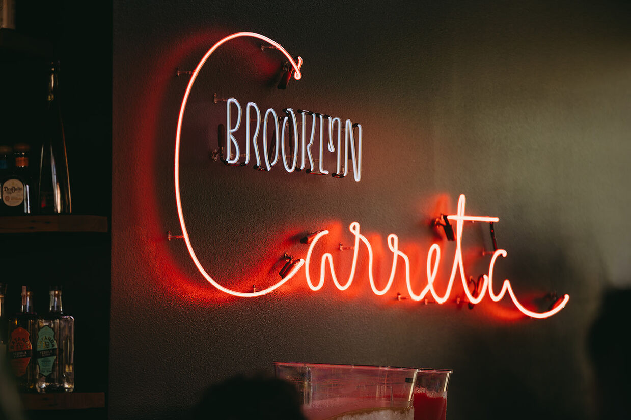 Brooklyn Carreta neon sign at a Portland food cart pod wedding