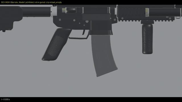 An empty reload: the bolt held open until the new magazine is seated
