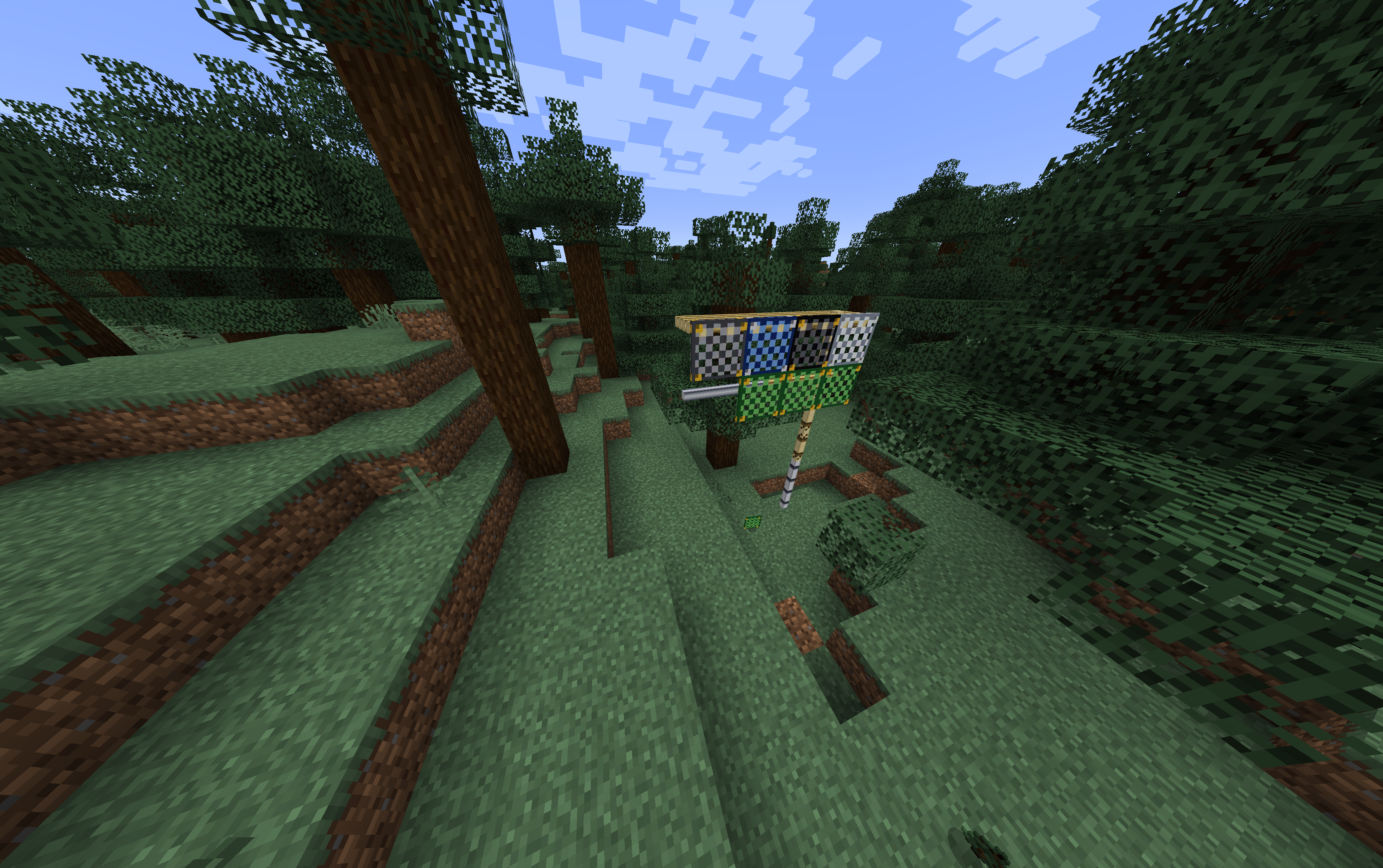 Bamboo scaffolding with green safety mesh in a forest