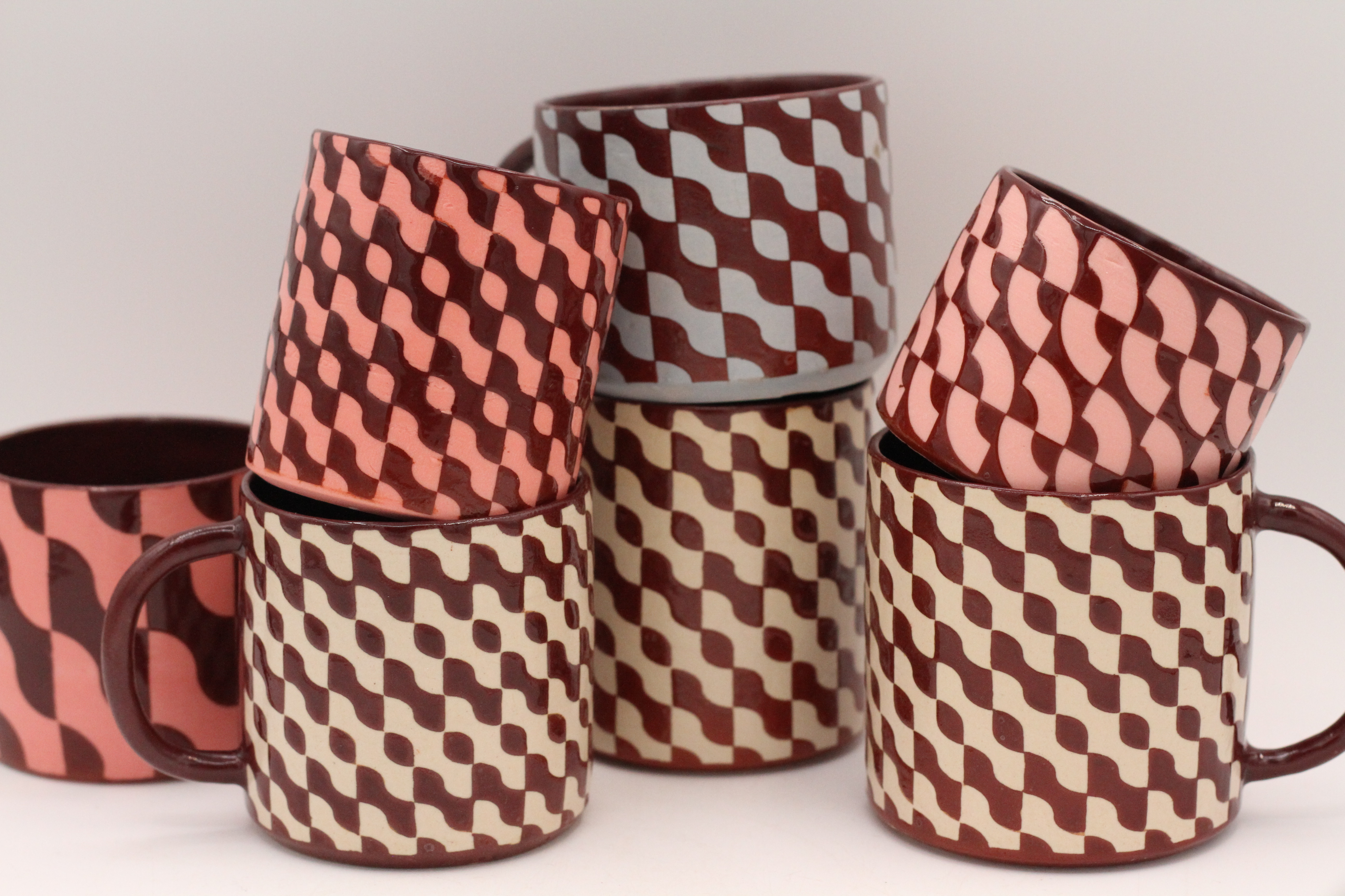assortment of ceramic mugs