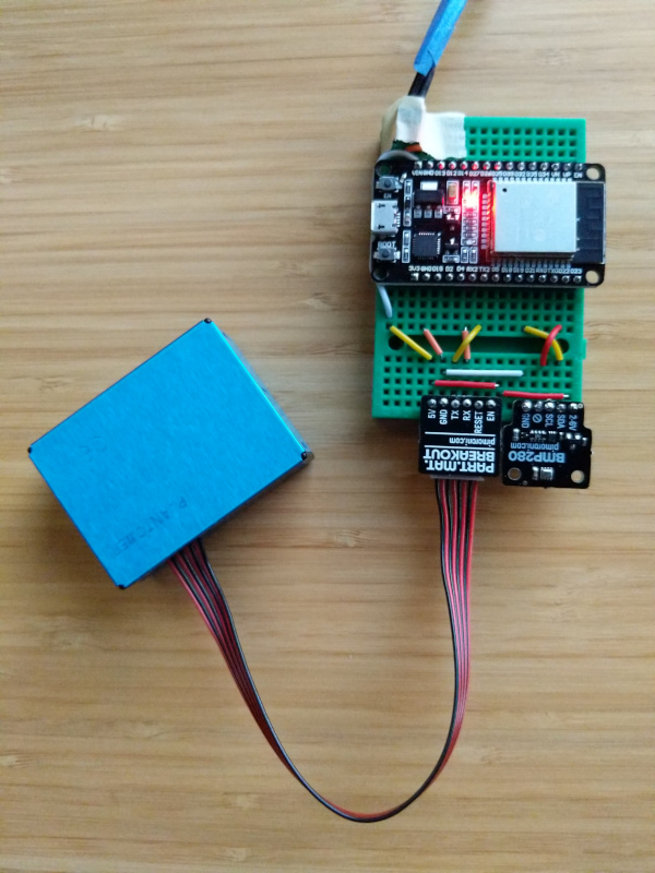 The ESP32 on a breadboard connected to the sensors