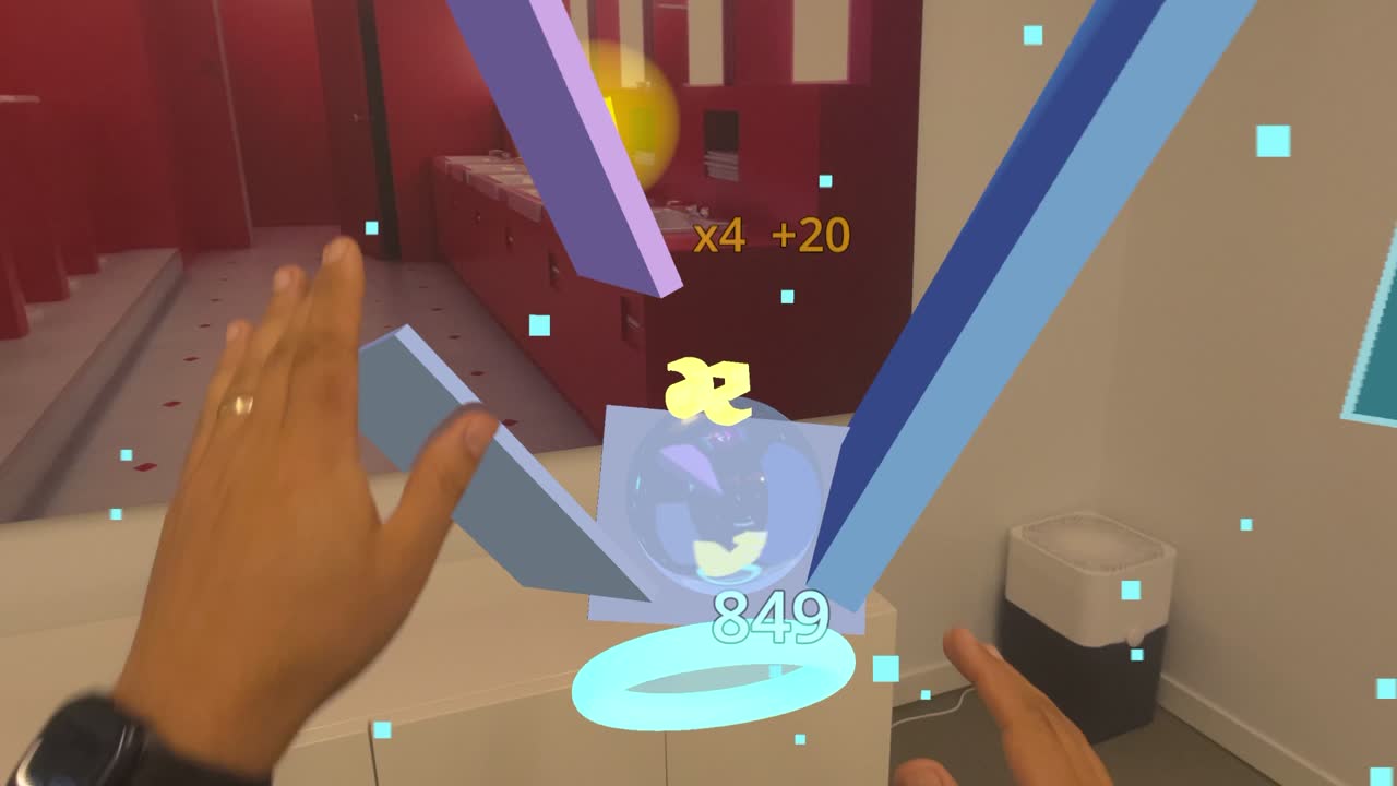 A round in progress: real Persona arms reaching in, the goal ring showing a running score of 849, a 3D "x8" cash-out popup, ramps and a transmuted sphere — all over restroom passthrough