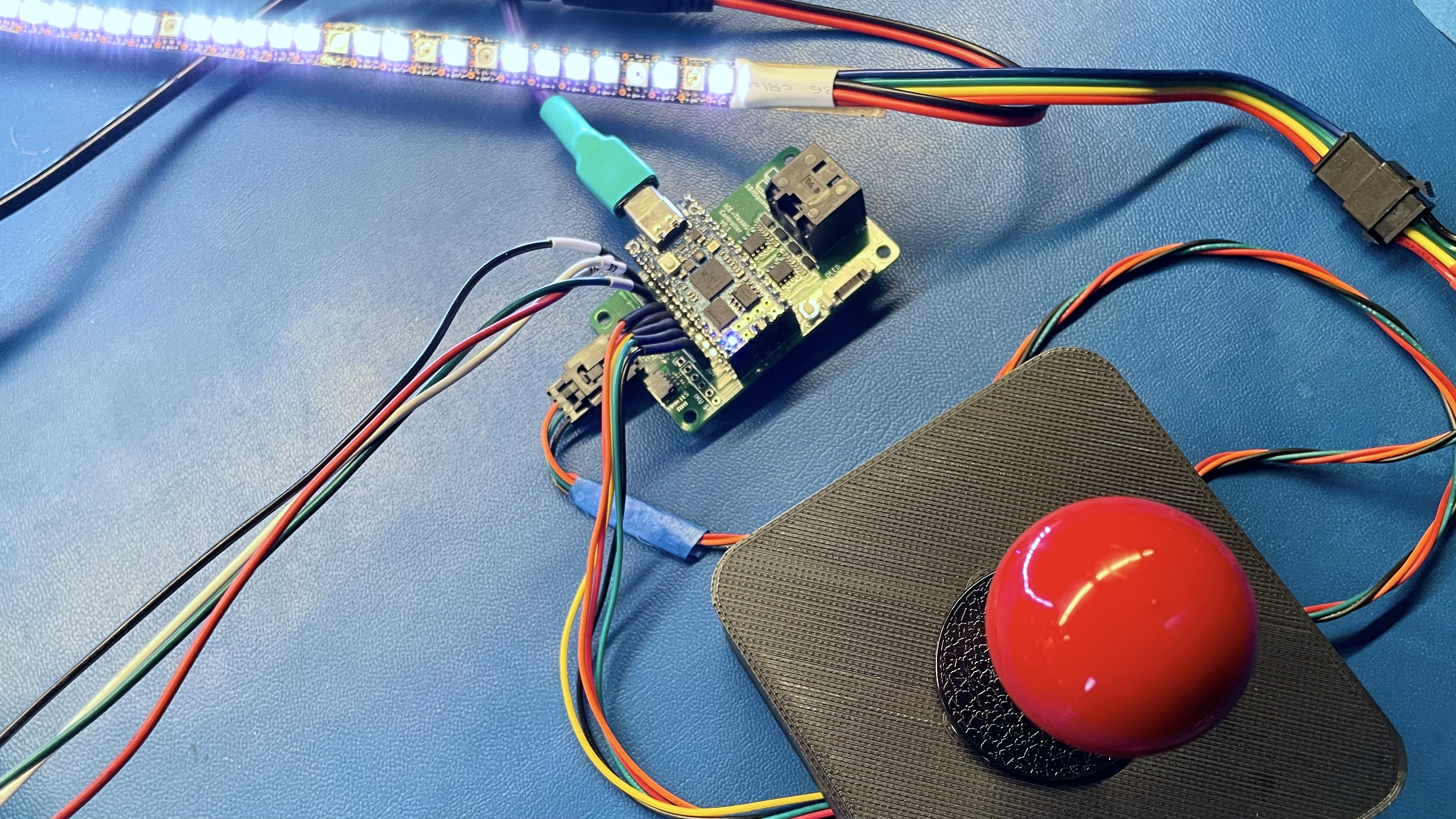 The minimum vaiable setup, using the iCEtwang controller board, an APA102 LED strip and an arcade joystick
