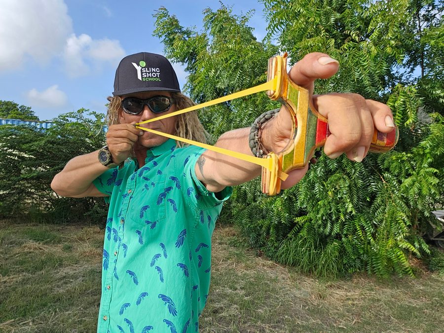 Instructor aiming a slingshot