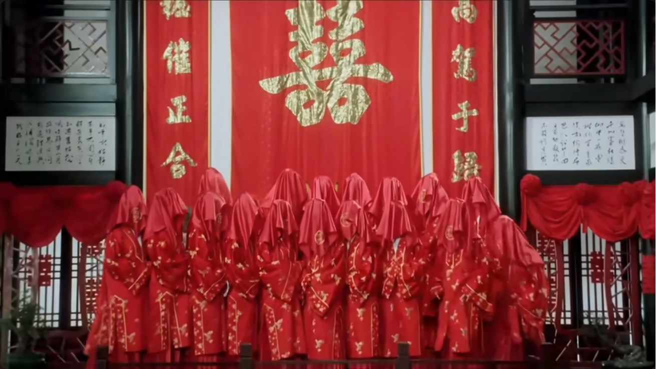 《唐伯虎點秋香》中的一幕。圖片中有二十位新娘。片中主角唐伯虎要從這二十位新娘中，選中他的新娘秋香。