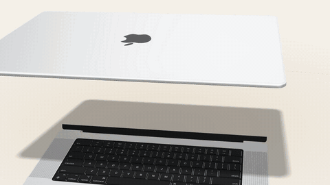 Desk: MacBook lid opens and a phone slides in