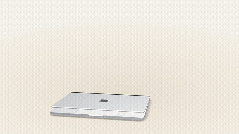 Desk: MacBook lid opens on a live dashboard and a phone slides in beside it