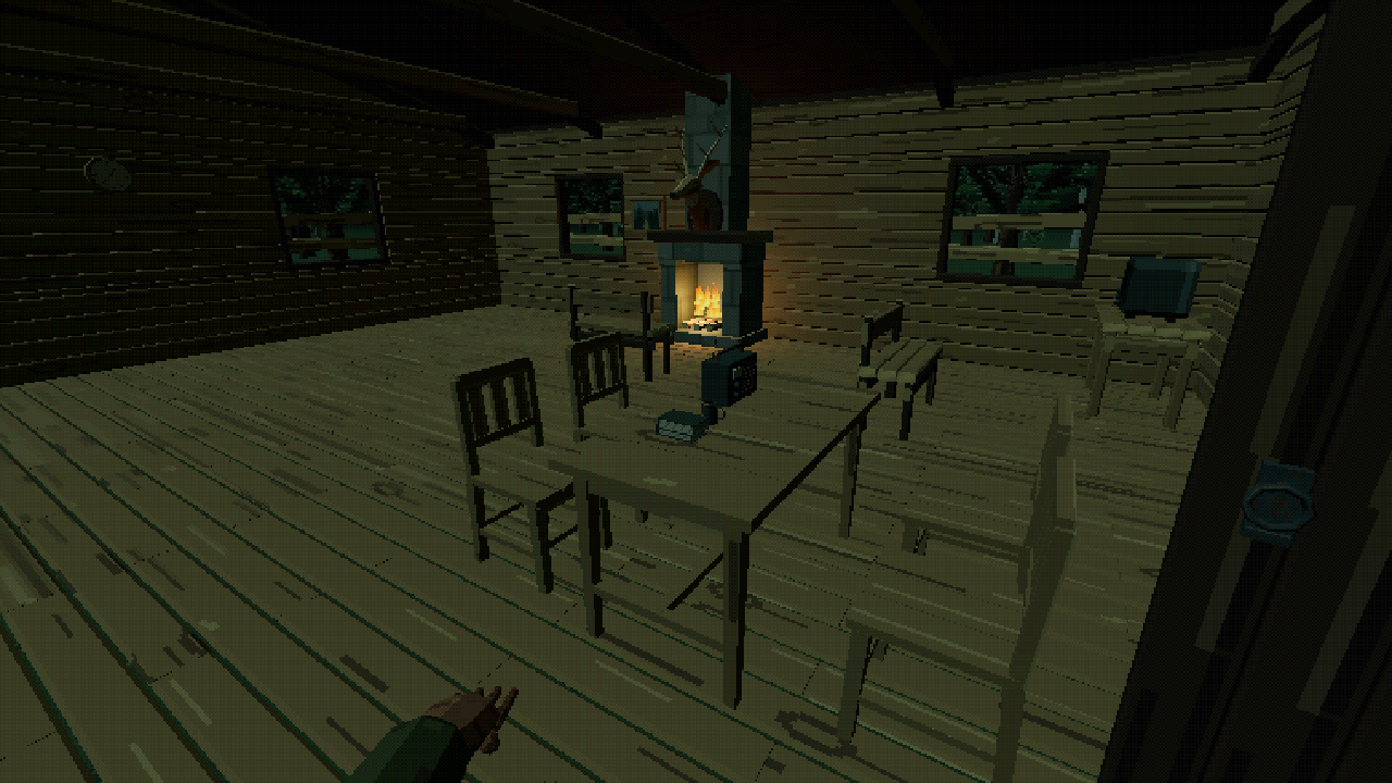 Furnished cabin interior and burning fireplace