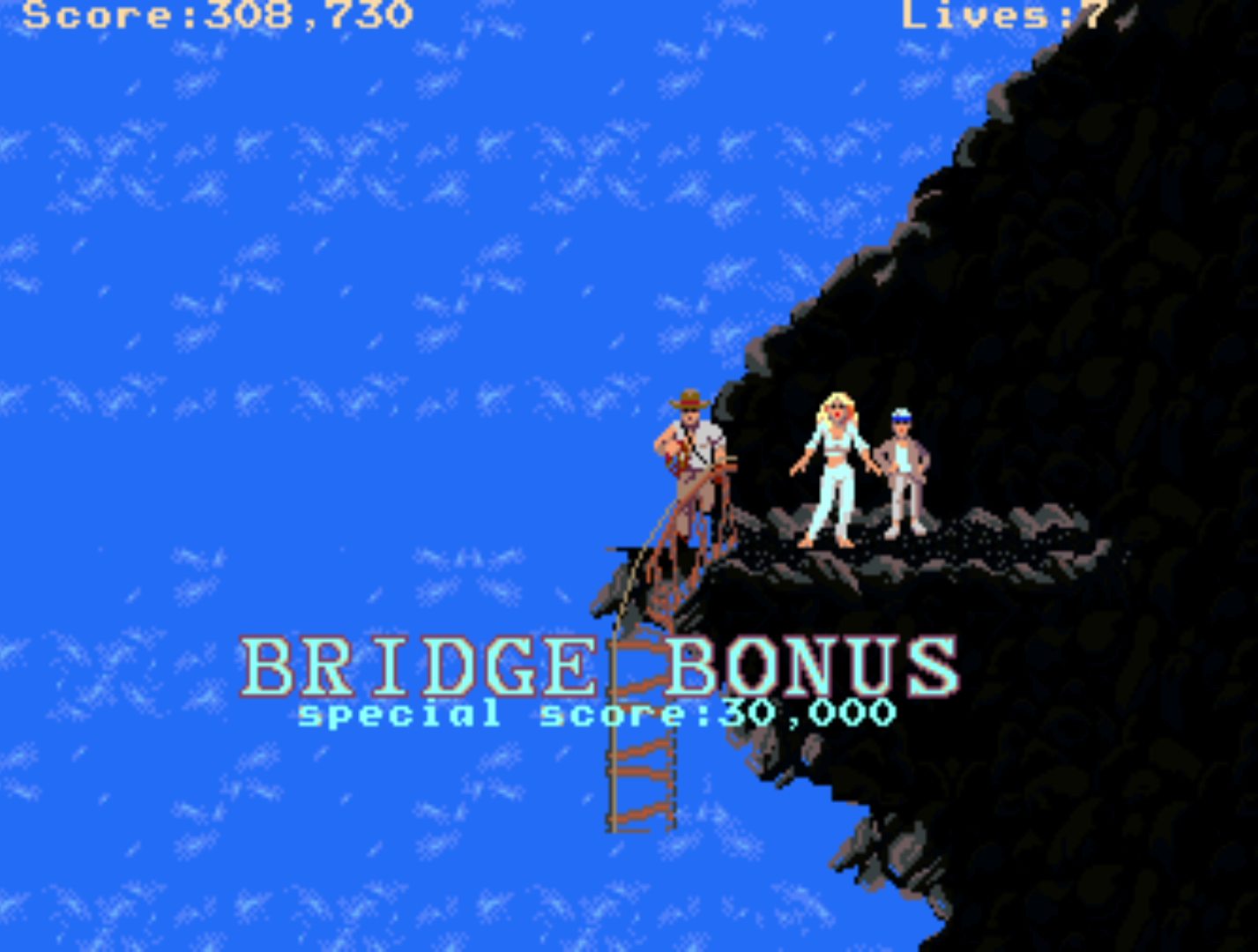 Rope bridge stage where Indy reaches a woman and child as the rope bridge snaps