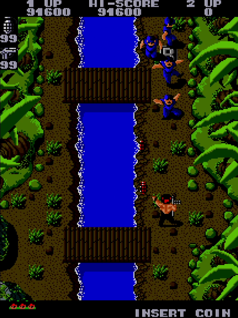 Player character walking along a riverbank, throwing red grenades at enemies