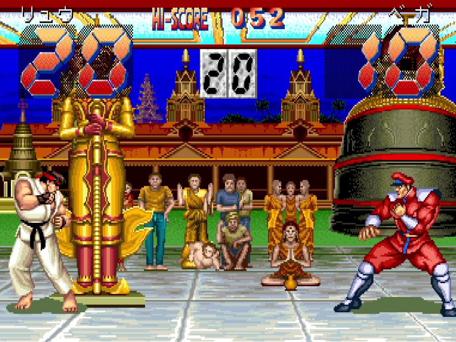 Stage showing Ryu and Bison facing off with score overlay