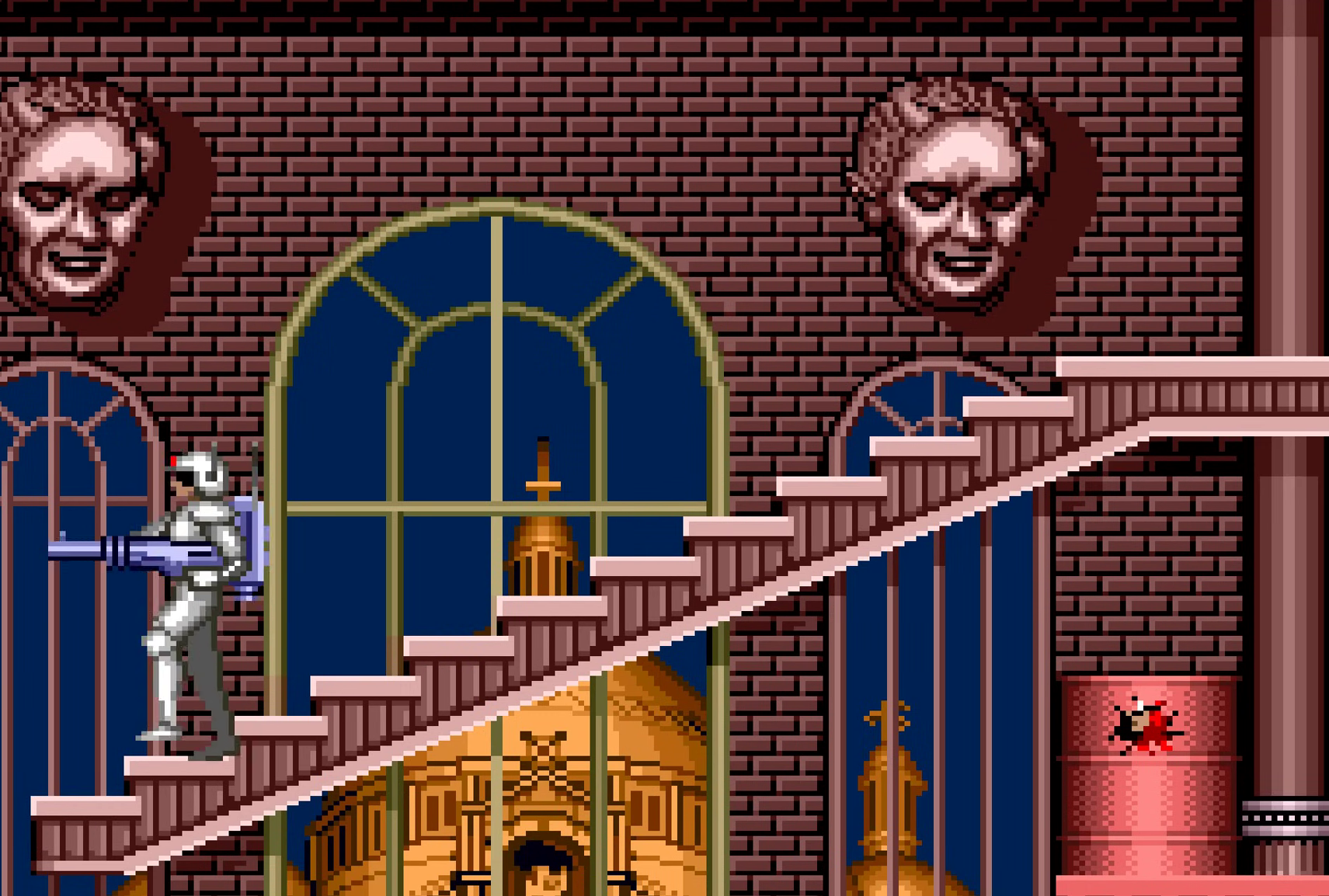 Climbing staircase with eerie face sculpture on wall