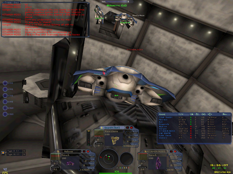 Screenshot: a fighter inside a station hangar bay
