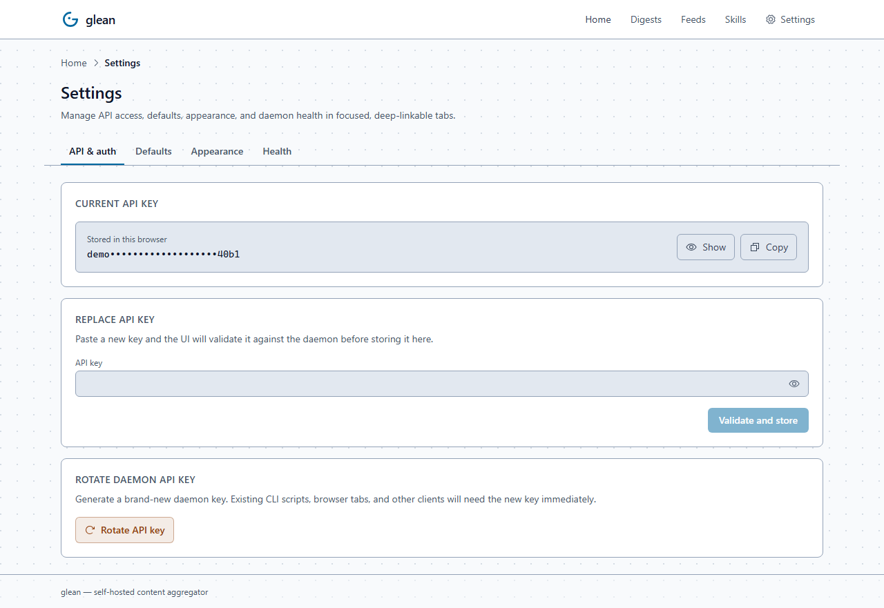 Settings page showing 4 sub-tabs (API & auth / Defaults / Appearance / Health) with the API & auth tab active, current API key state, and a Replace key form