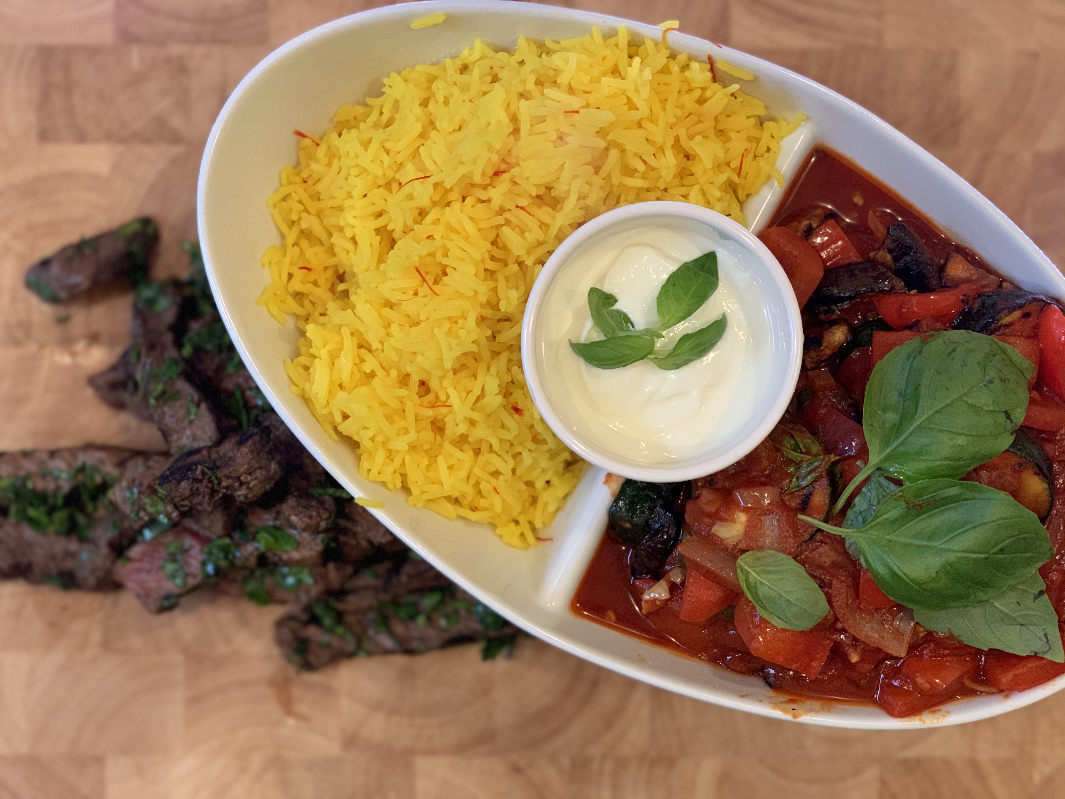 Grilled steak ratatouille and saffron rice