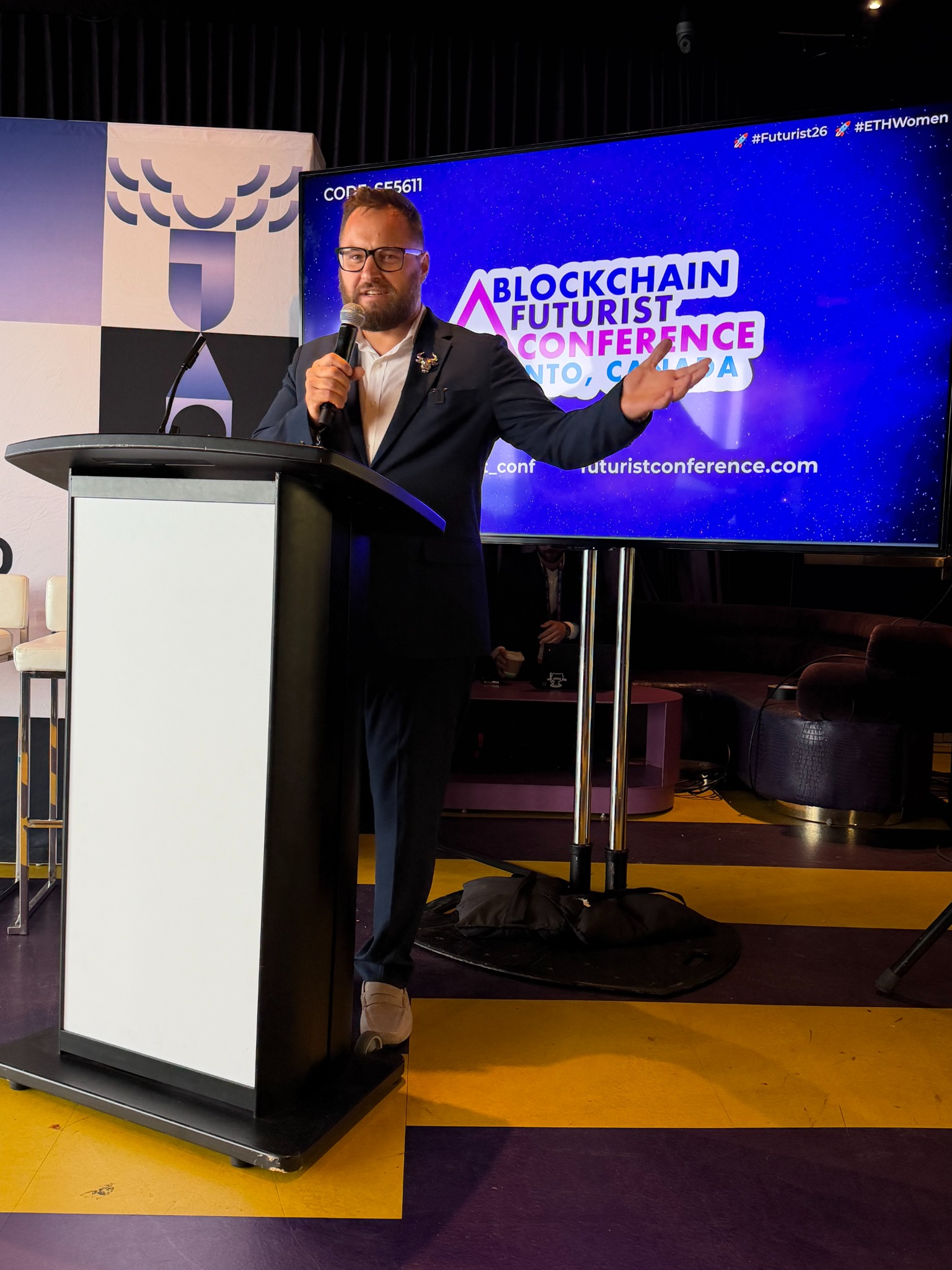 JChains speaking on stage