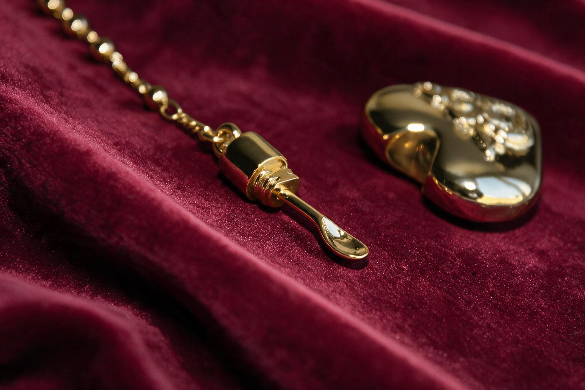 Heart and spoon necklace editorial photograph 3