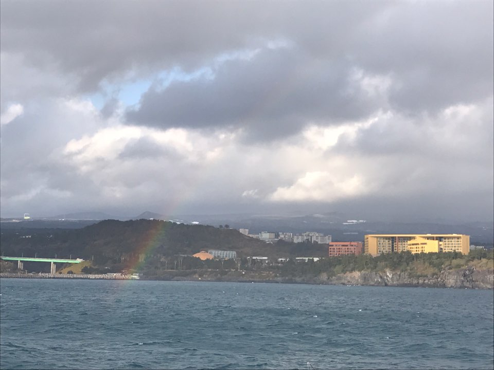 Jeju sailing yacht and coastline