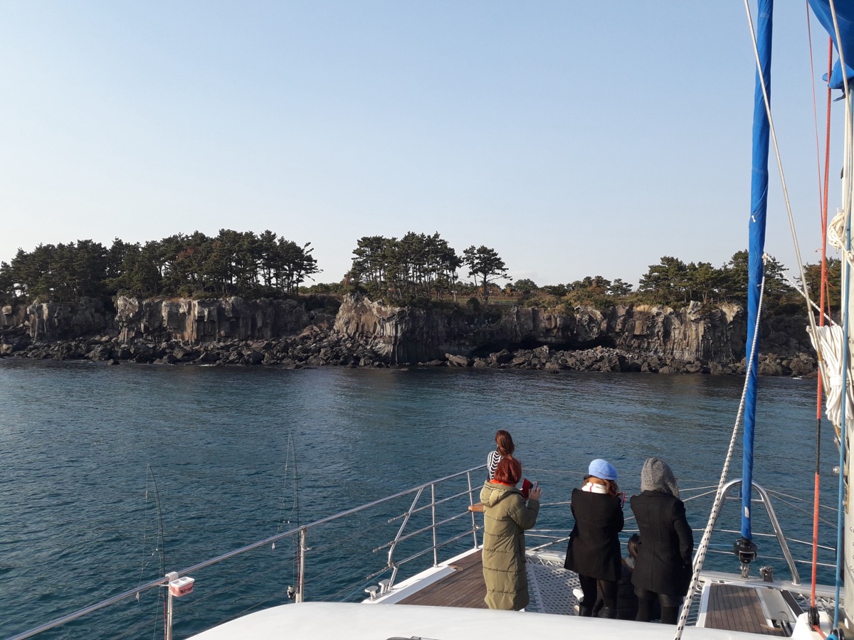 Jeju sailing yacht and coastline