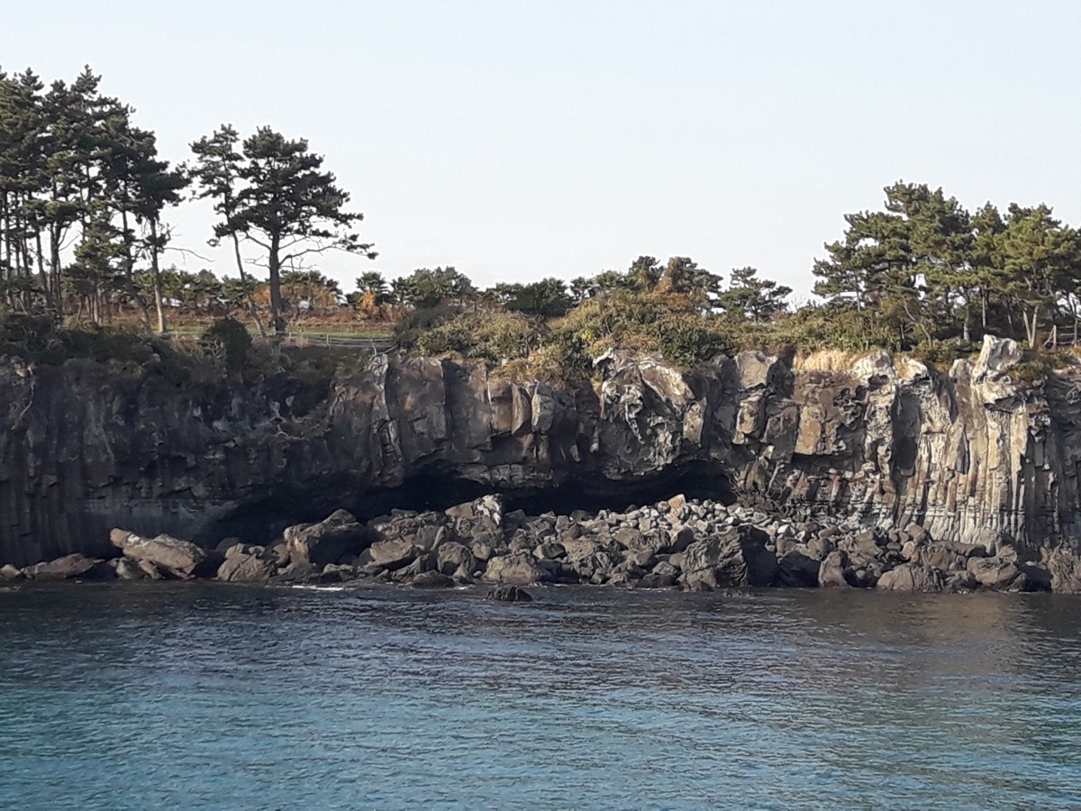 Jeju sailing yacht and coastline