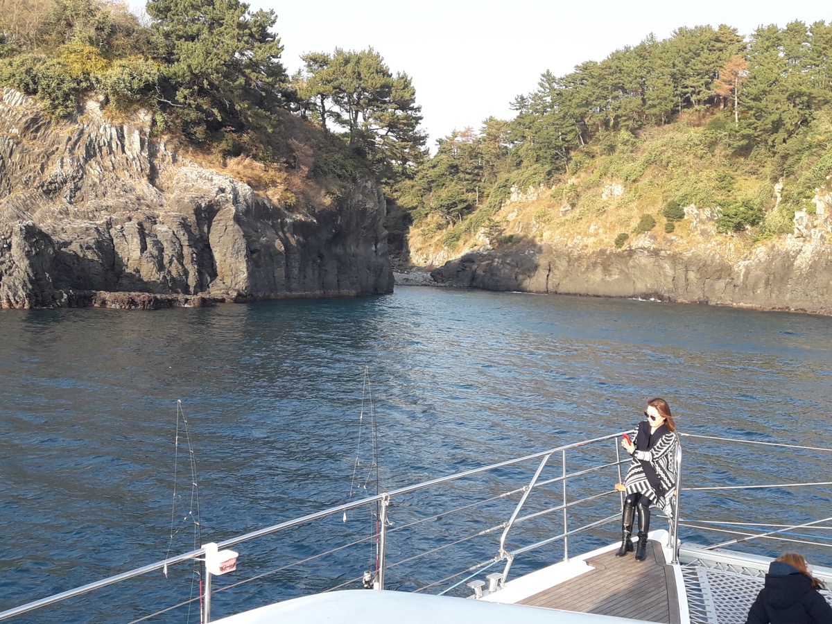 Jeju sailing yacht and coastline