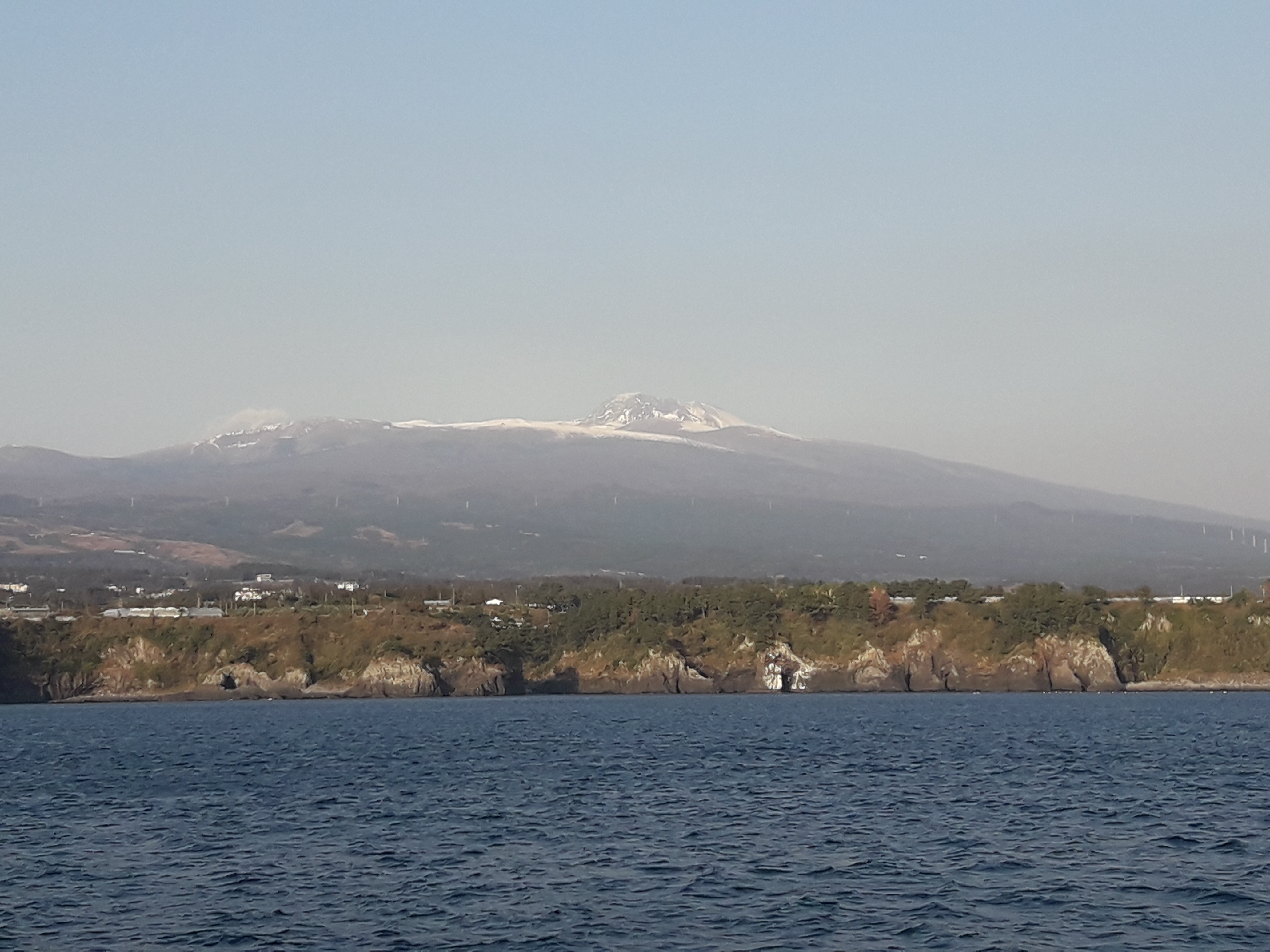 Jeju sailing yacht and coastline