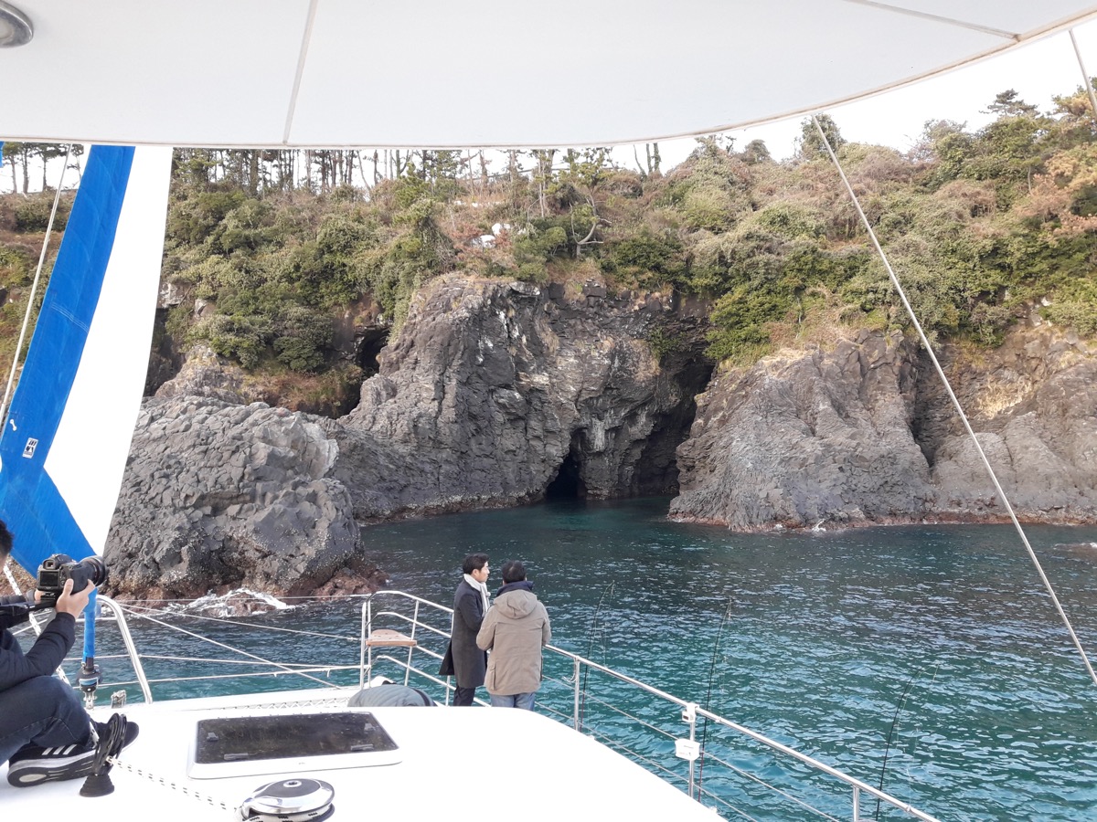 Jeju sailing yacht and coastline