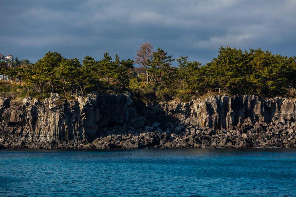 Jeju sailing yacht and coastline