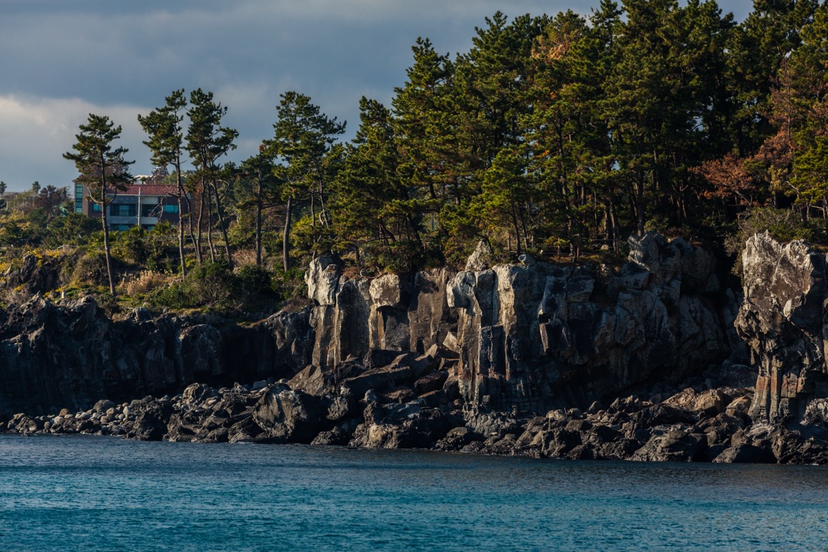 Jeju sailing yacht and coastline