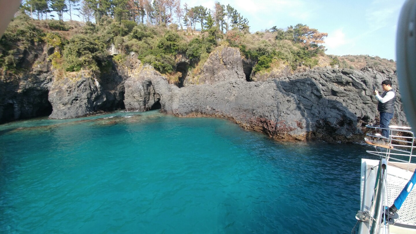 Jeju sailing yacht and coastline