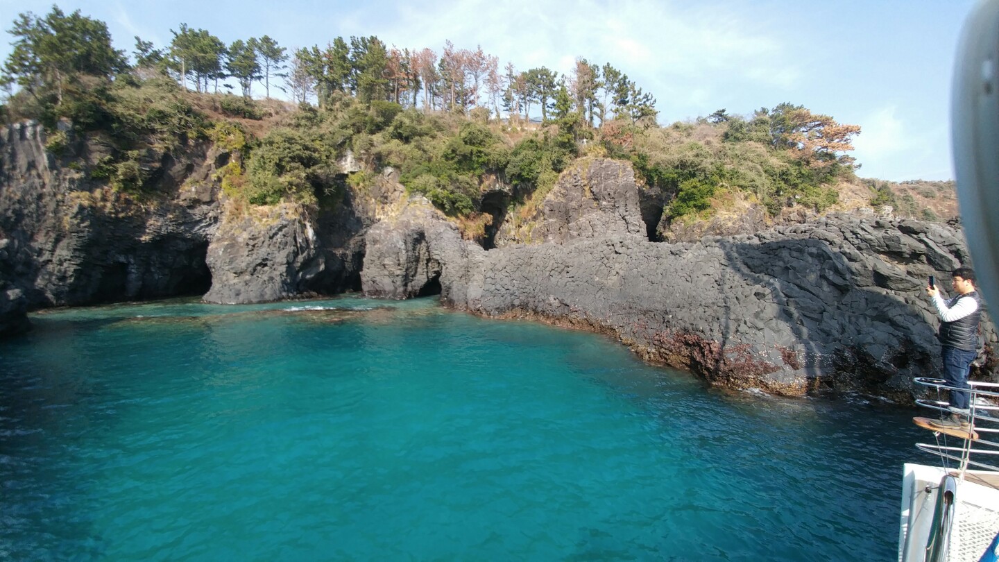Jeju sailing yacht and coastline