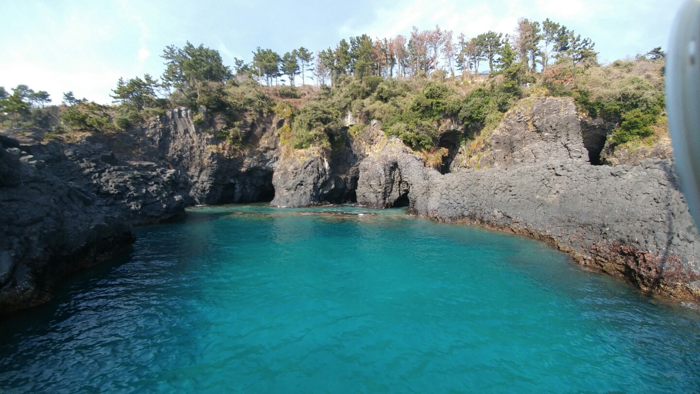 Jeju sailing yacht and coastline
