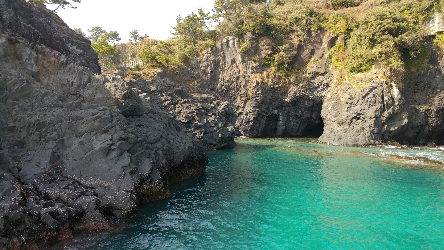 Jeju sailing yacht and coastline