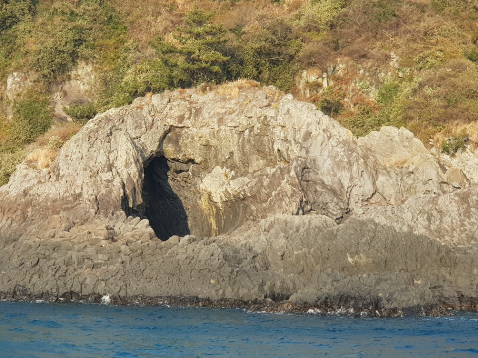 Jeju sailing yacht and coastline
