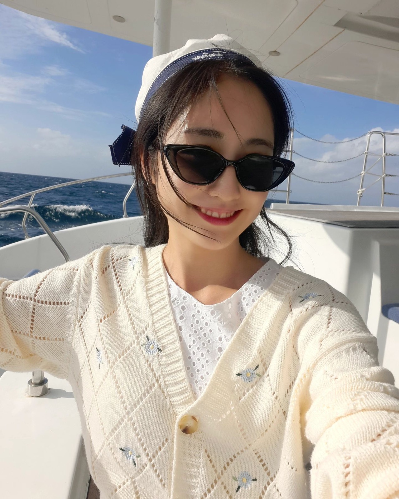 Guest on Grande Bleu sunset cruise