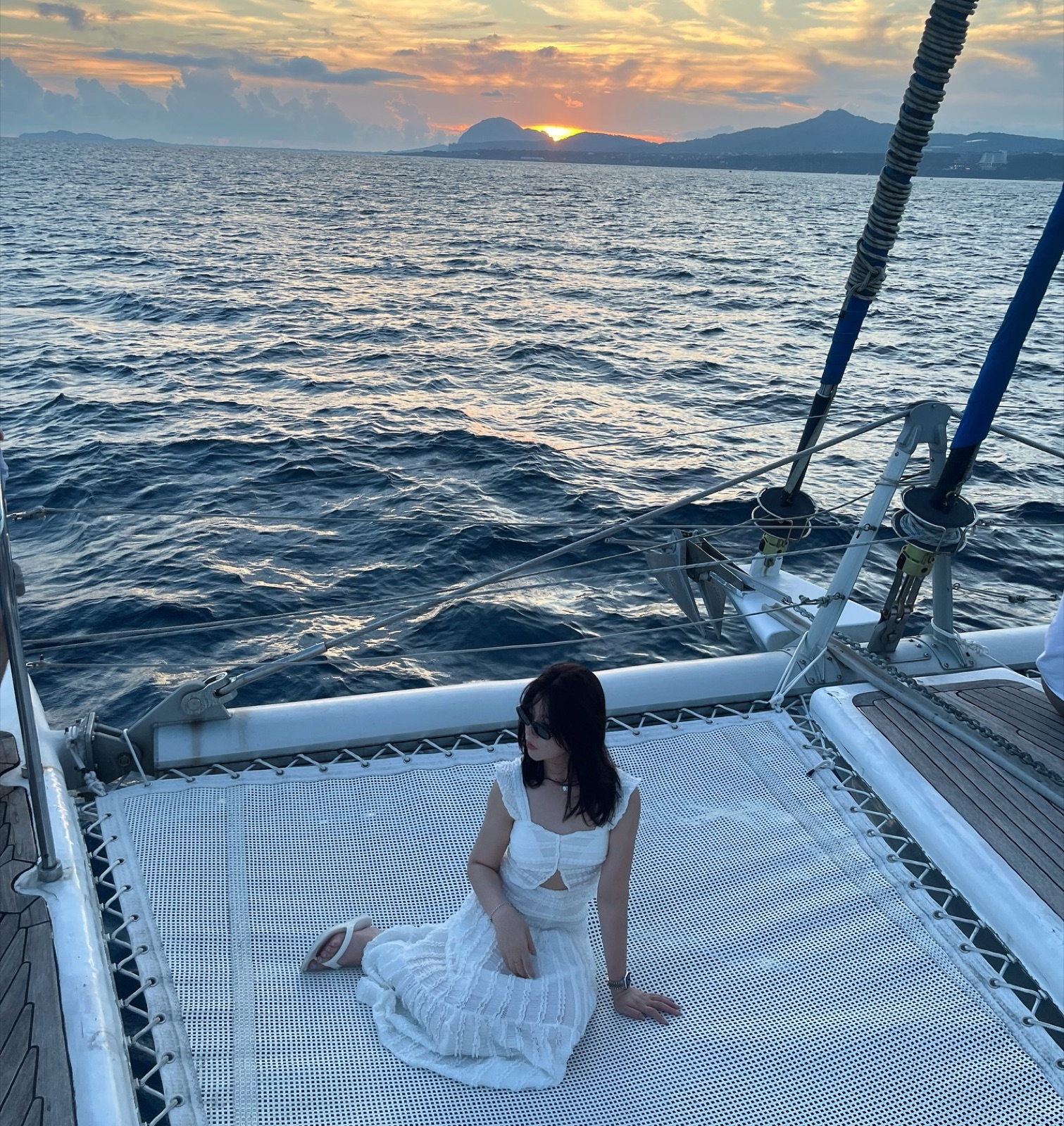Guest on catamaran deck Jeju