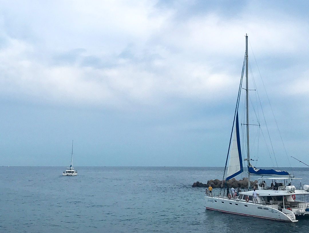 Jeju sailing yacht and coastline