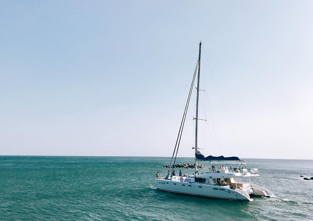 Jeju sailing yacht and coastline