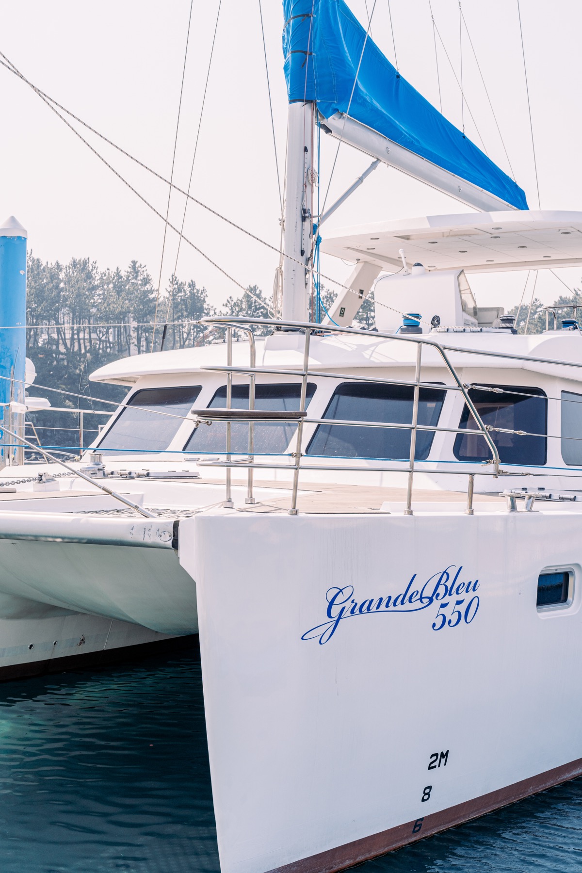 Jeju sailing yacht and coastline