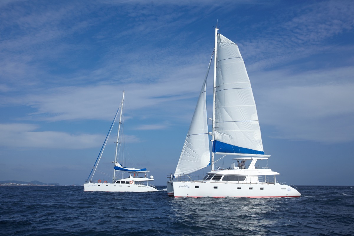 Jeju sailing yacht and coastline