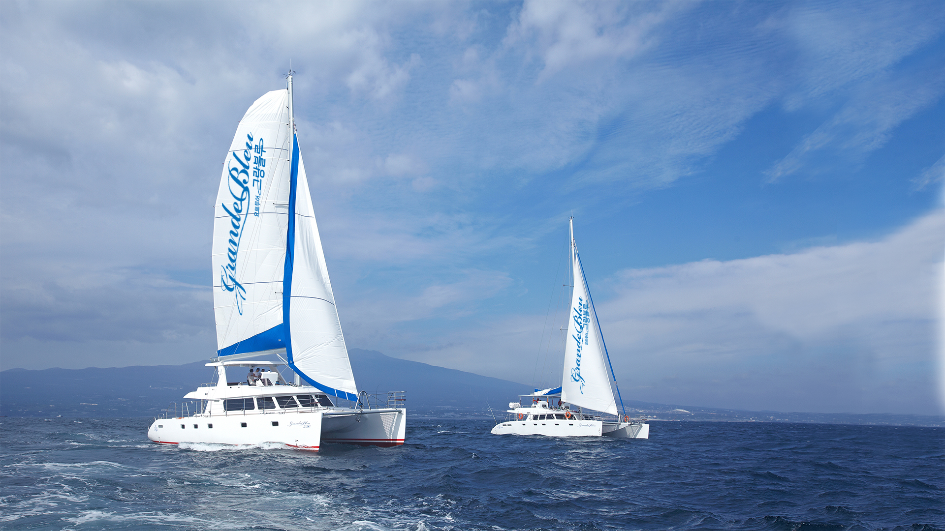 Jeju sailing yacht and coastline