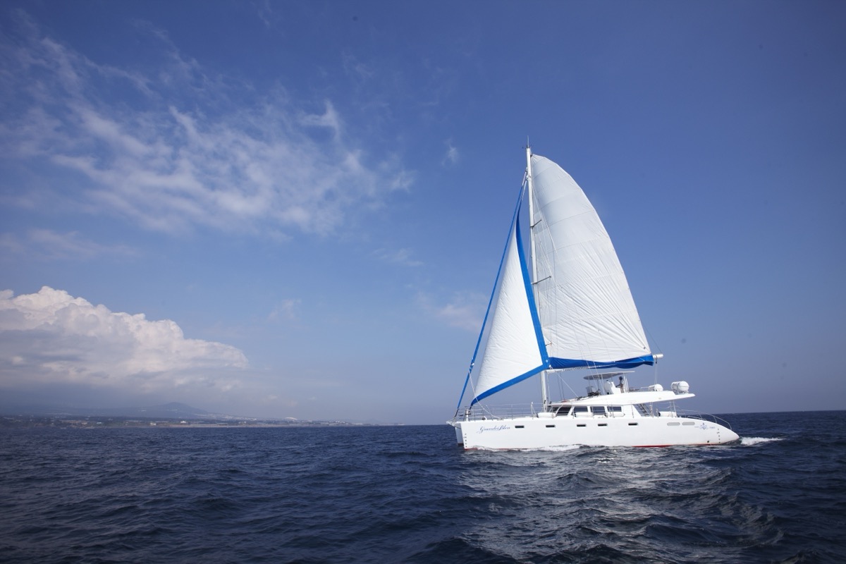 Jeju sailing yacht and coastline