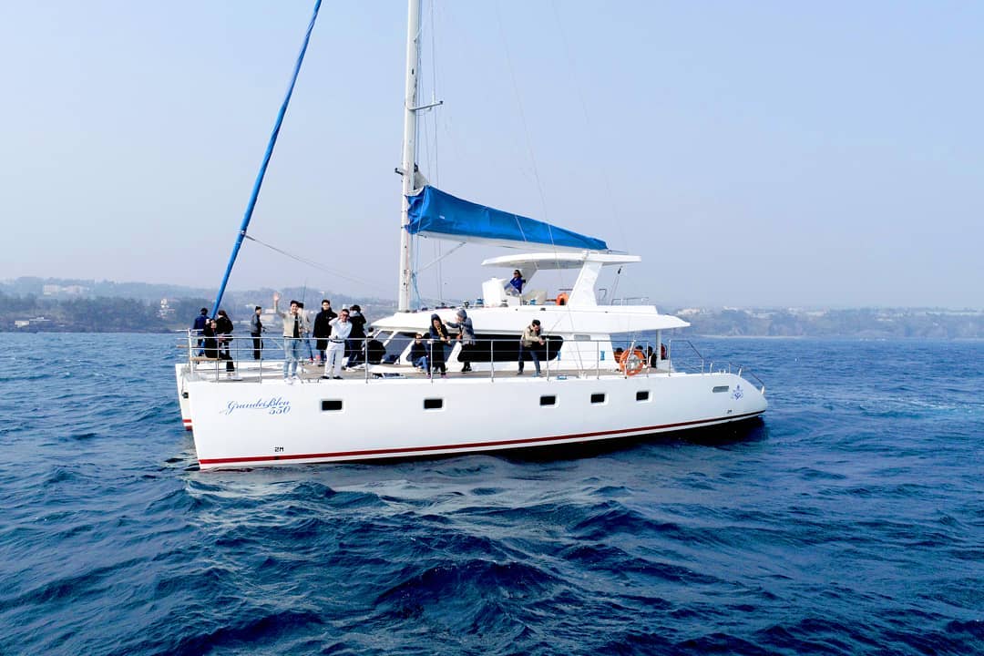 Jeju sailing yacht and coastline