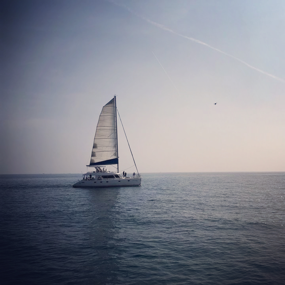 Jeju sailing yacht and coastline