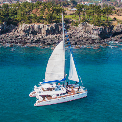 Jeju sailing yacht and coastline