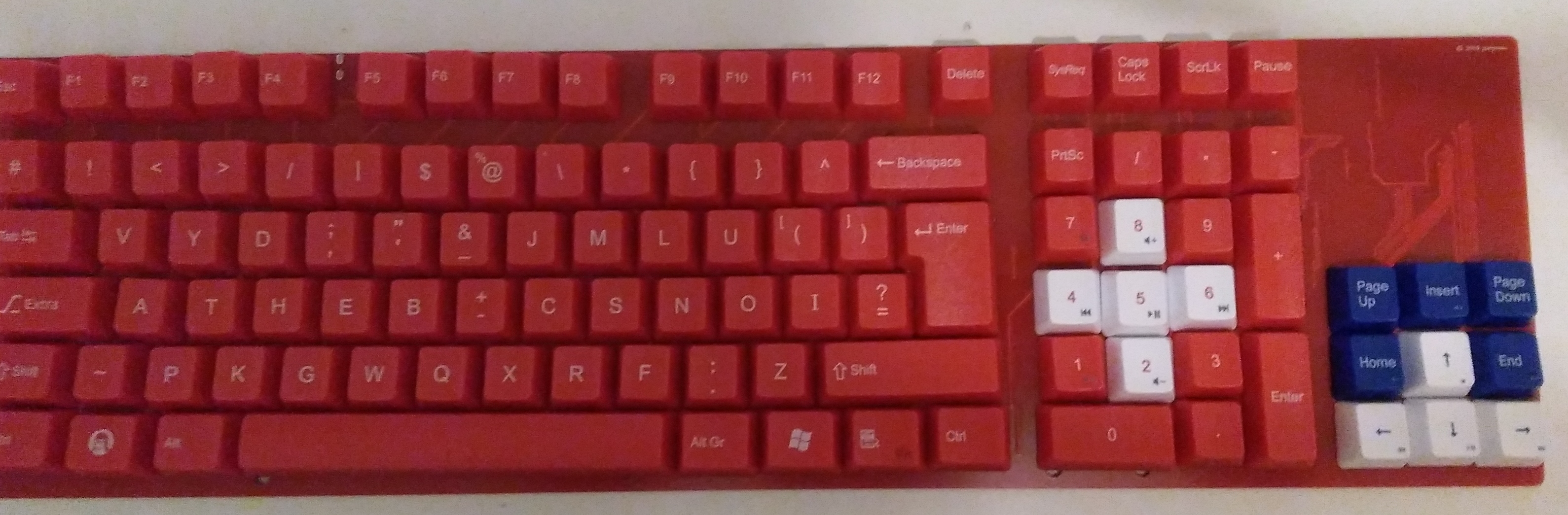 bad photograph of keycaps on top of PCB